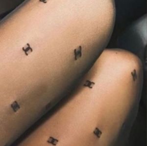 100 authentic Chanel Runway Tights nylons CC size small